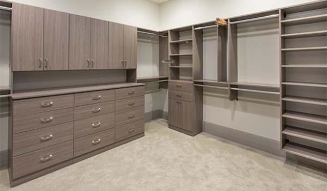 This is an example of a transitional storage and wardrobe in Omaha.