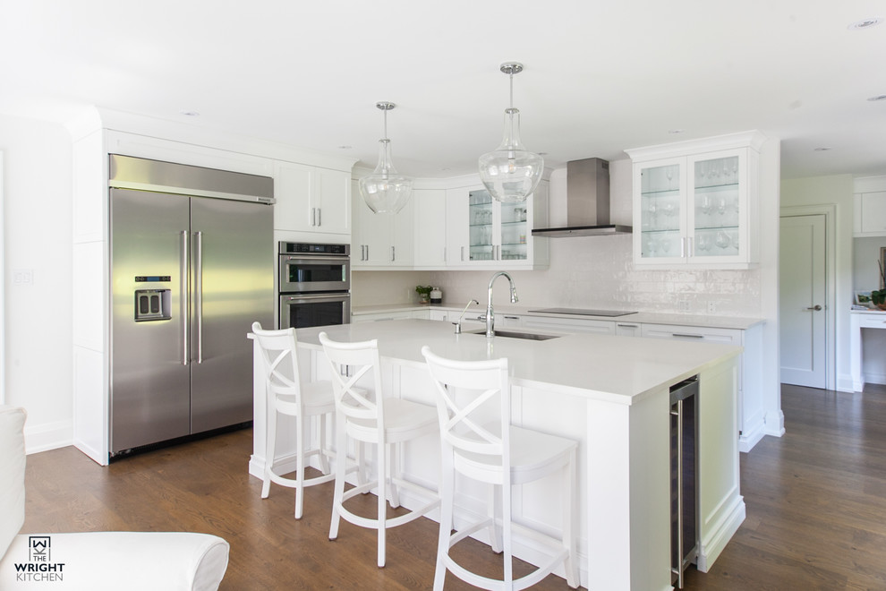 Example of a transitional kitchen design in Toronto