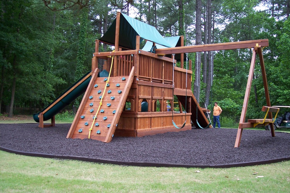 Inspiration for a mid-sized arts and crafts backyard full sun outdoor sport court for summer in Atlanta with with outdoor playset and mulch.