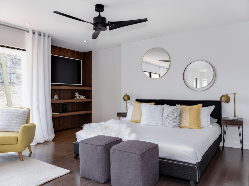 Bedroom - large contemporary master medium tone wood floor and brown floor bedroom idea in Montreal with white walls
