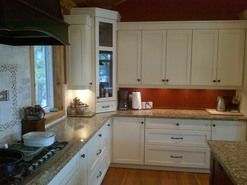 Example of a transitional kitchen design in Toronto