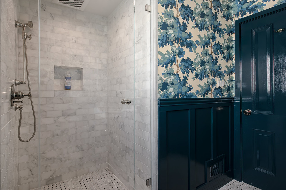 This is an example of a small traditional 3/4 bathroom in San Francisco with open cabinets, an alcove shower, a two-piece toilet, white tile, marble, multi-coloured walls, marble floors, a console sink, solid surface benchtops, white floor and a hinged shower door.