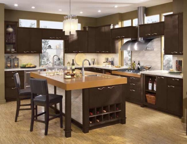 Photo of a mid-sized modern u-shaped separate kitchen in Other with a drop-in sink, flat-panel cabinets, dark wood cabinets, stainless steel appliances and with island.