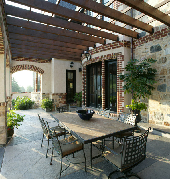 Photo of a large traditional patio in Philadelphia.