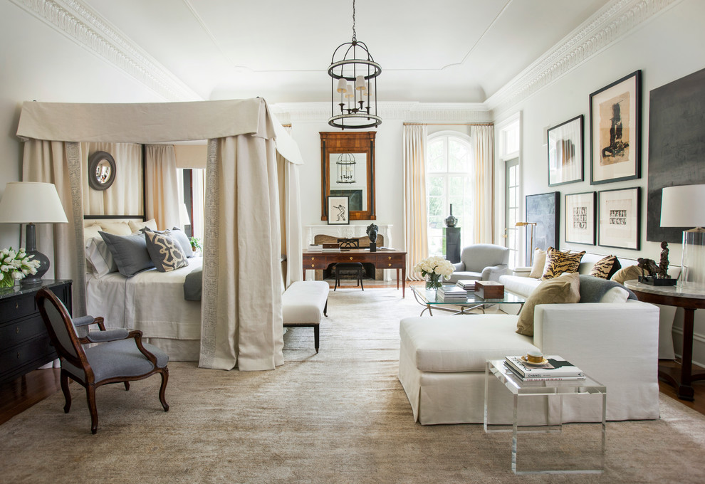 Inspiration for an expansive traditional bedroom in Atlanta with white walls.
