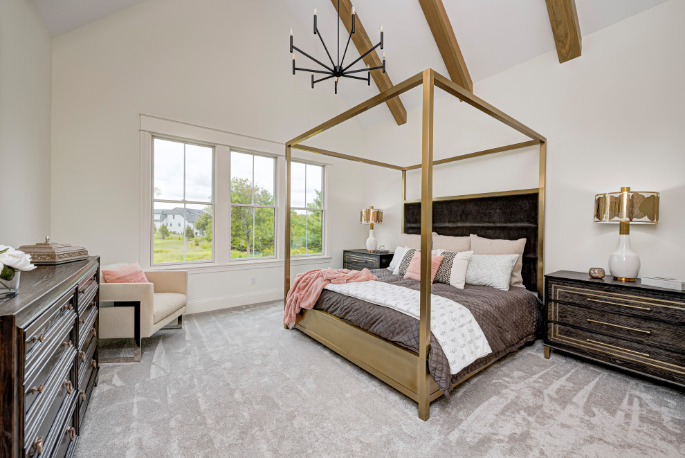 Example of a mid-sized transitional master carpeted, gray floor and vaulted ceiling bedroom design in Indianapolis with white walls