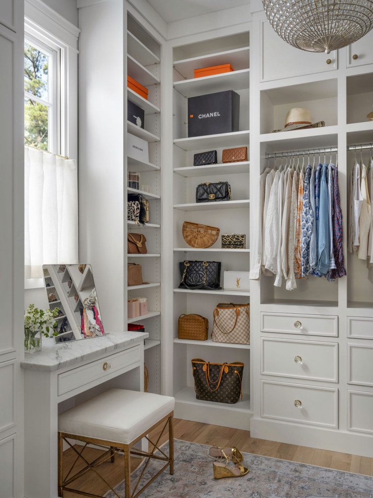 Closet - traditional women's medium tone wood floor and brown floor closet idea in Atlanta with open cabinets and white cabinets