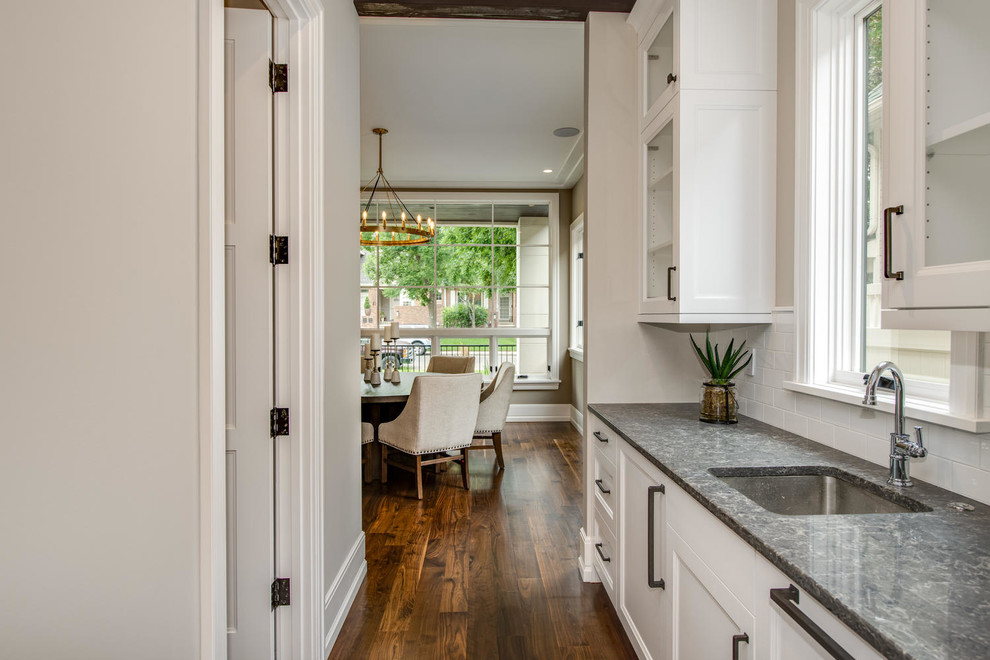 Example of a transitional kitchen design in Denver