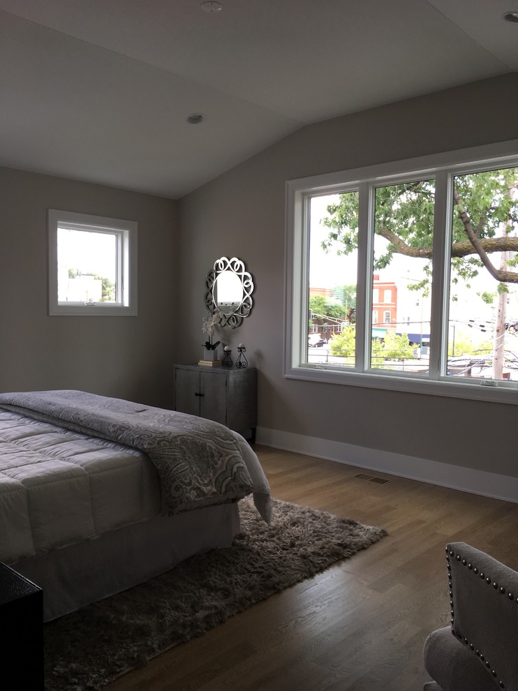 Example of a large transitional master light wood floor and beige floor home design design in Chicago with beige walls