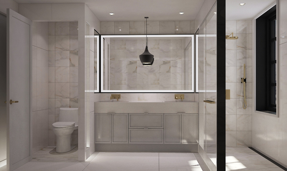Photo of a large contemporary master bathroom in New York with recessed-panel cabinets, grey cabinets, a freestanding tub, a curbless shower, a two-piece toilet, multi-coloured tile, stone tile, multi-coloured walls, porcelain floors, an integrated sink and quartzite benchtops.