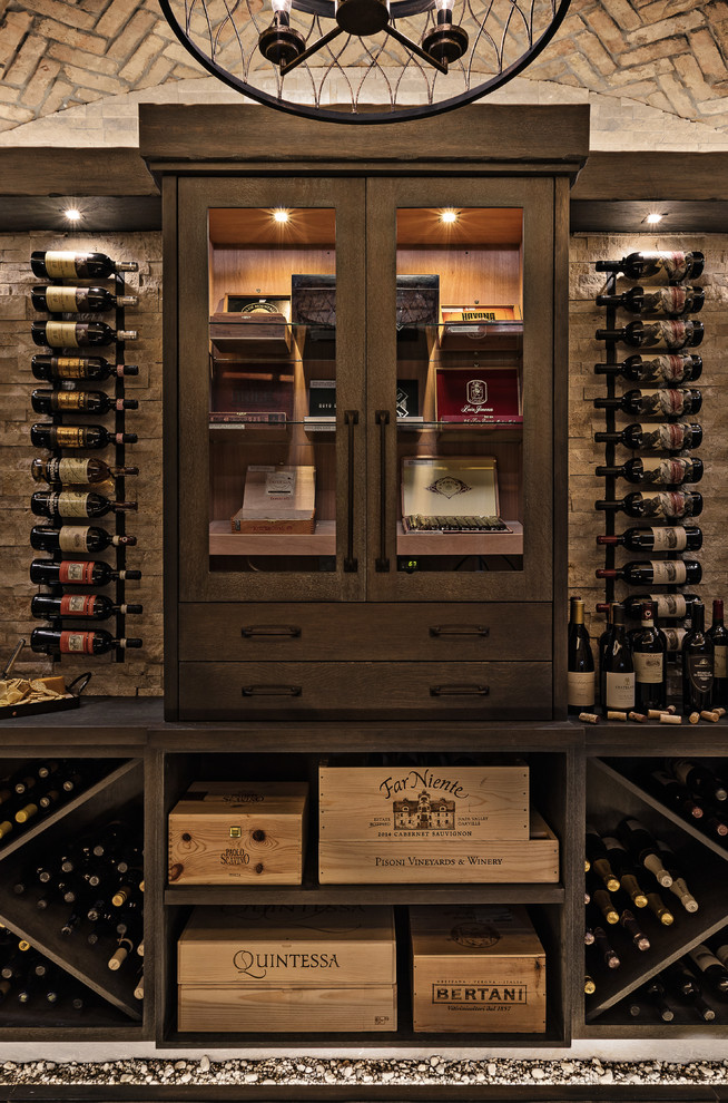 Inspiration for a mid-sized transitional wine cellar in Detroit with slate floors, display racks and grey floor.