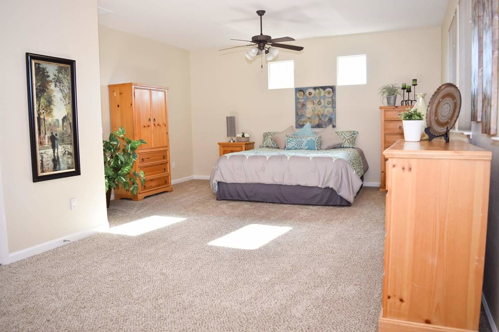 Bedroom - large traditional master carpeted and beige floor bedroom idea in Sacramento with beige walls and no fireplace