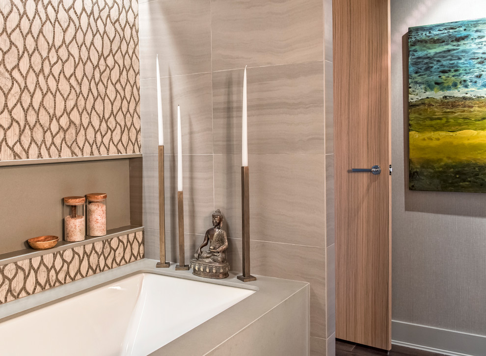 This is an example of a mid-sized contemporary master bathroom in Vancouver with flat-panel cabinets, brown cabinets, an undermount tub, a corner shower, a two-piece toilet, gray tile, mosaic tile, beige walls, porcelain floors, an undermount sink and wood benchtops.