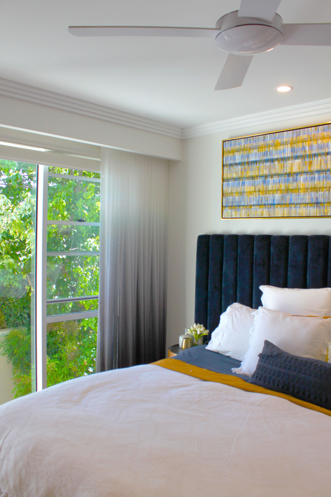 Photo of a contemporary master bedroom in Canberra - Queanbeyan with white walls.