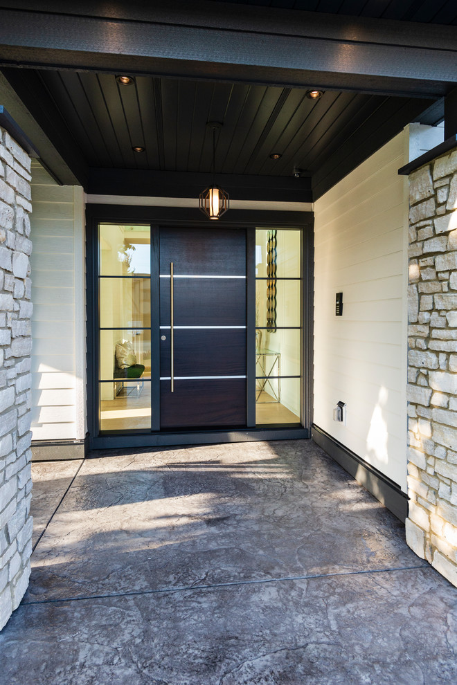 Front door - mid-sized transitional light wood floor and beige floor front door idea in Vancouver with white walls and a dark wood front door
