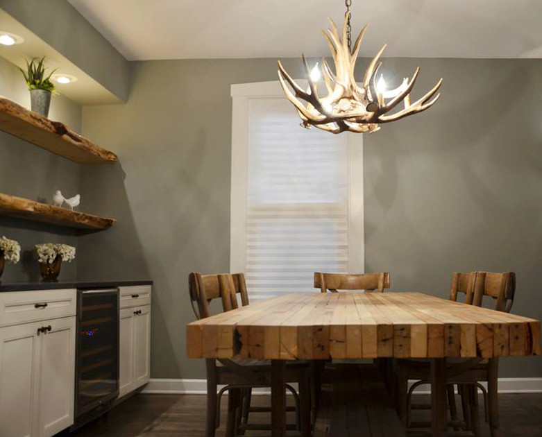 Mid-sized mountain style dark wood floor and brown floor dining room photo in Chicago with gray walls and no fireplace