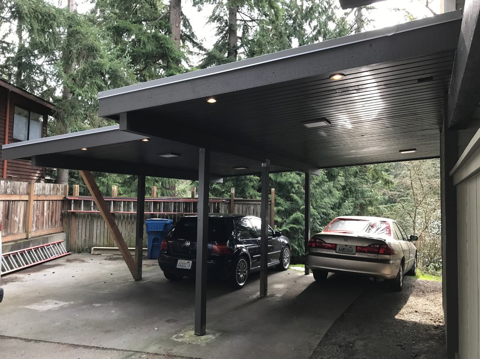Inspiration for a large transitional attached four-car carport in Seattle.