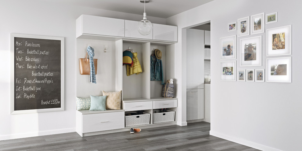 Design ideas for a mid-sized contemporary mudroom in Nashville with white walls and painted wood floors.