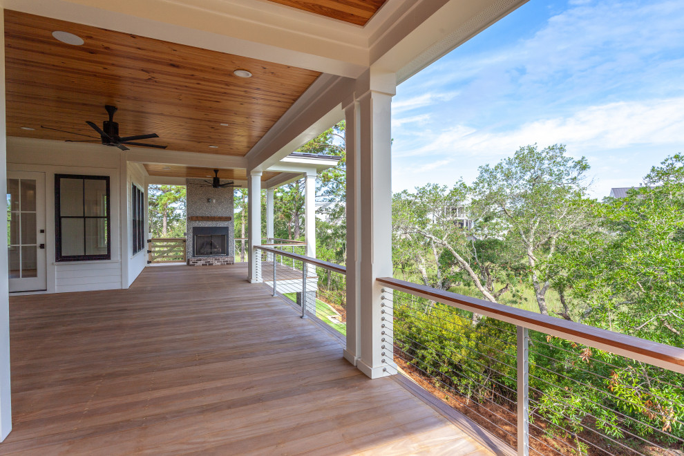 Photo of an expansive beach style balcony in Charleston.
