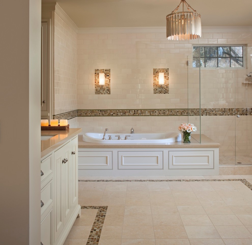 Large transitional master bathroom in San Francisco with raised-panel cabinets, white cabinets, a corner tub, an open shower, a one-piece toilet, beige tile, ceramic tile, beige walls, ceramic floors, a drop-in sink, soapstone benchtops, beige floor and an open shower.