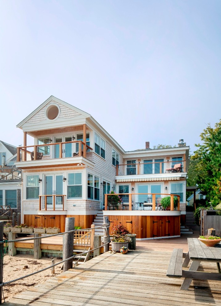 Design ideas for a beach style two-storey exterior in Boston.