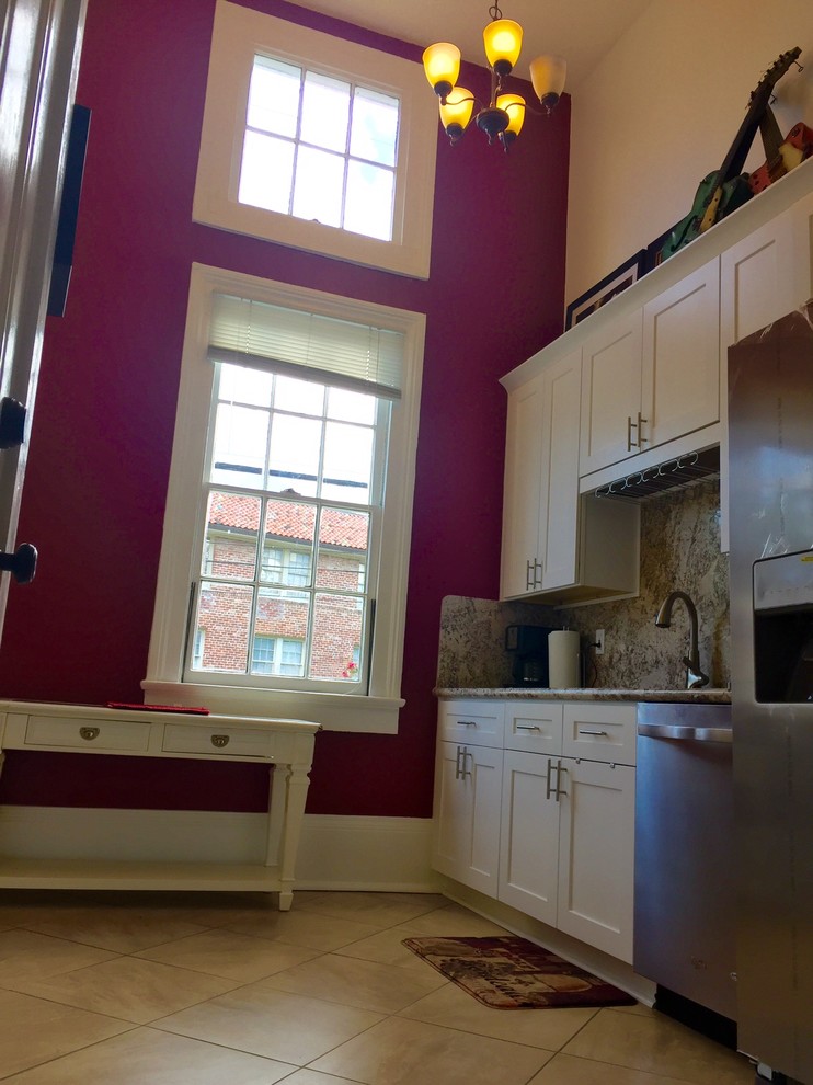 Example of a transitional kitchen design in New Orleans