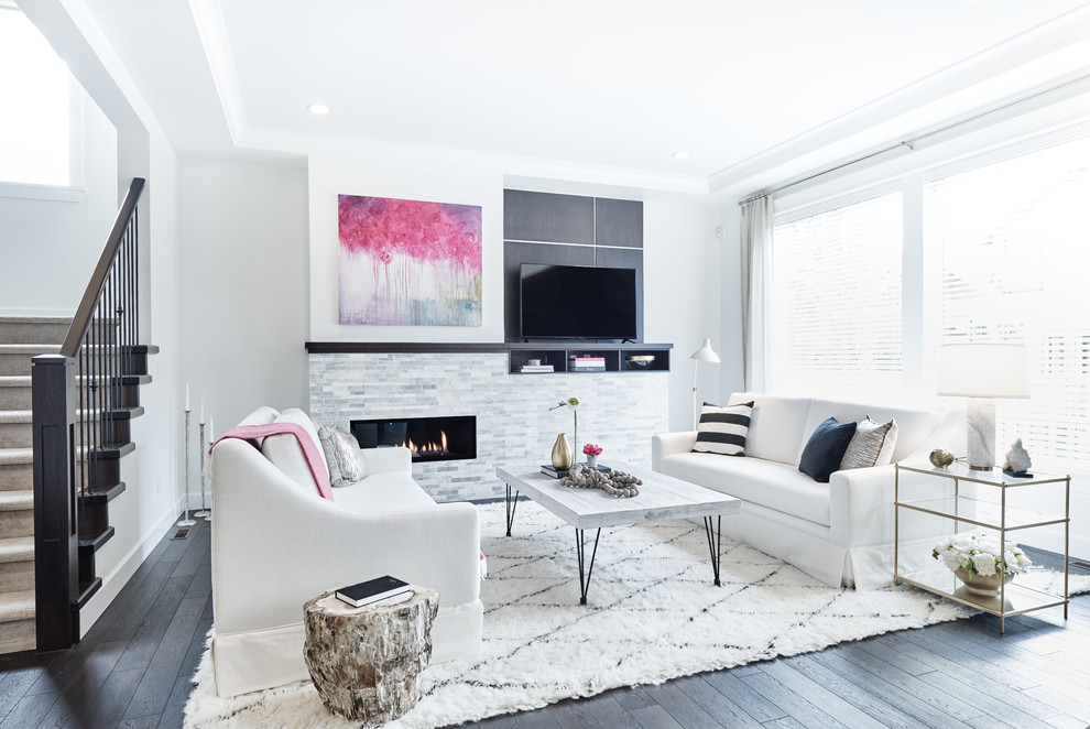 This is an example of a contemporary formal open concept living room in Vancouver with white walls, dark hardwood floors, a ribbon fireplace, a tile fireplace surround and a wall-mounted tv.