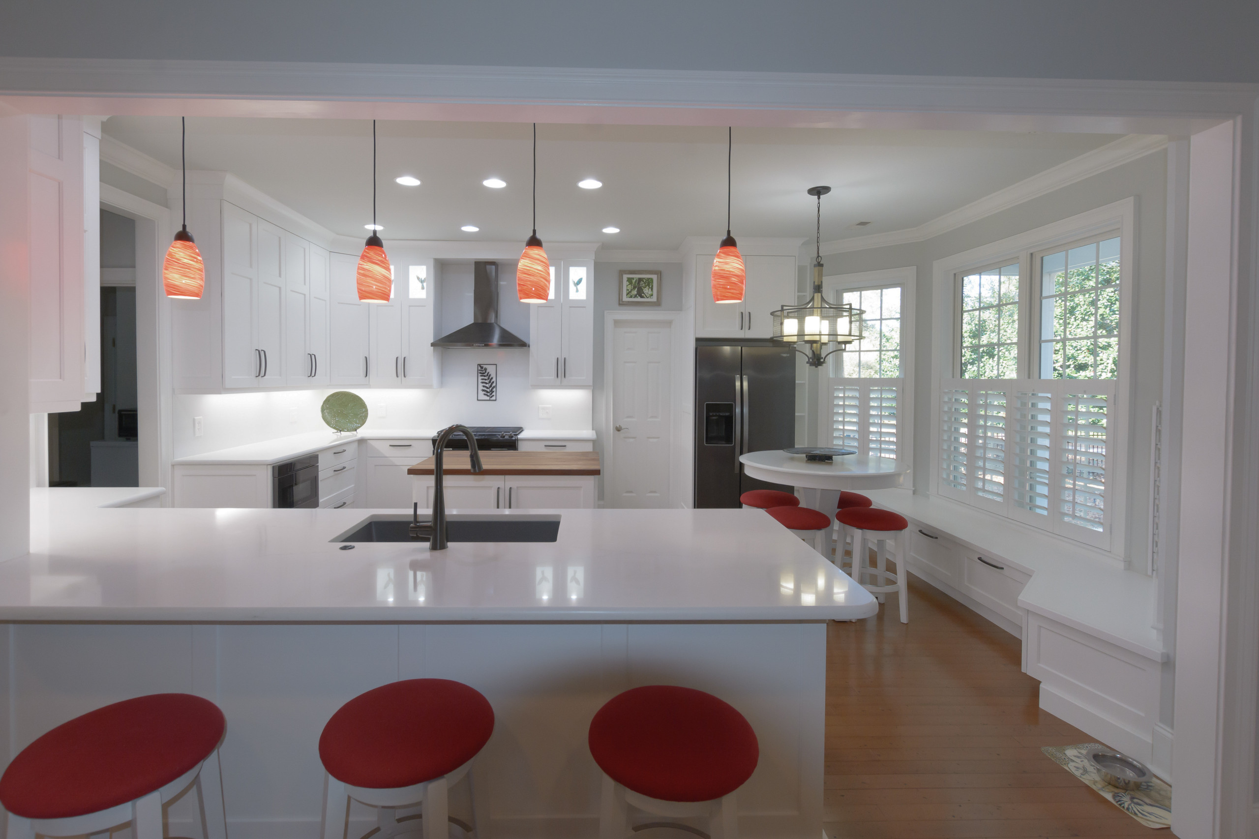Pawley's Island modern white kitchen with butcher block island
