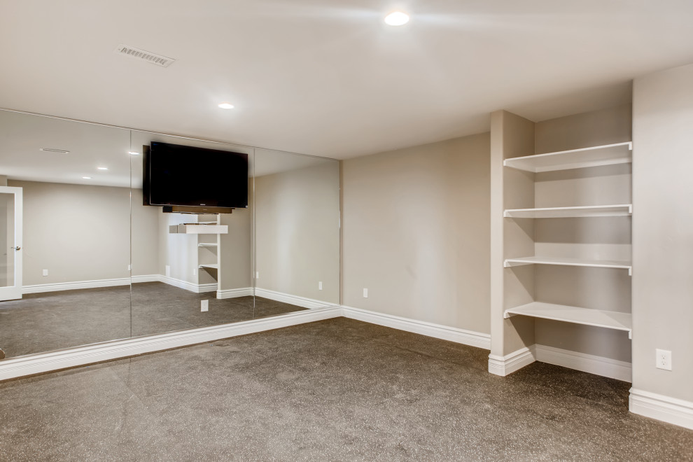 Design ideas for a large contemporary multi-use home gym in Denver with grey walls and grey floors.