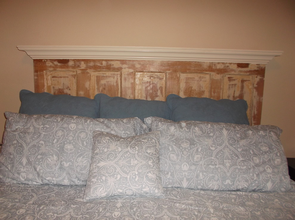 Example of a farmhouse bedroom design in Dallas