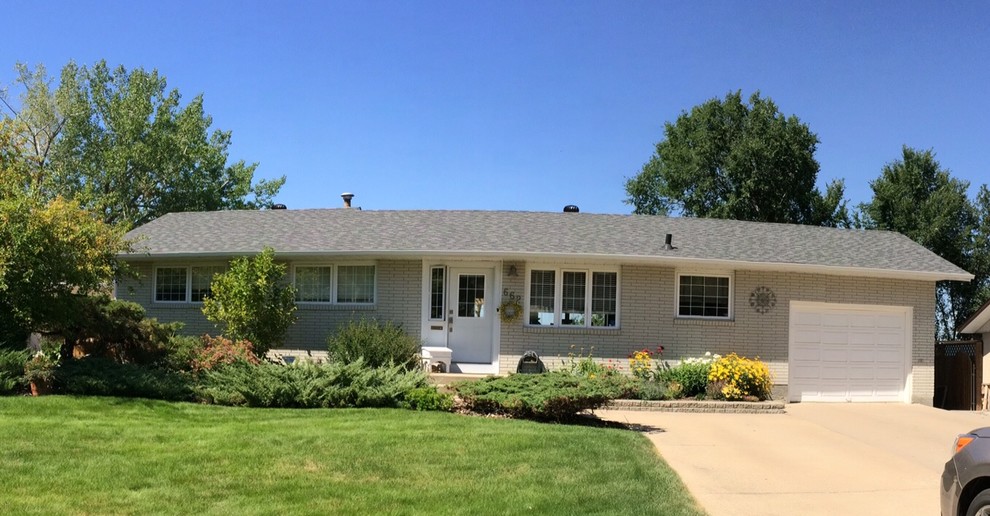 Any suggestions for more curb appeal for low roof ranch style home?
