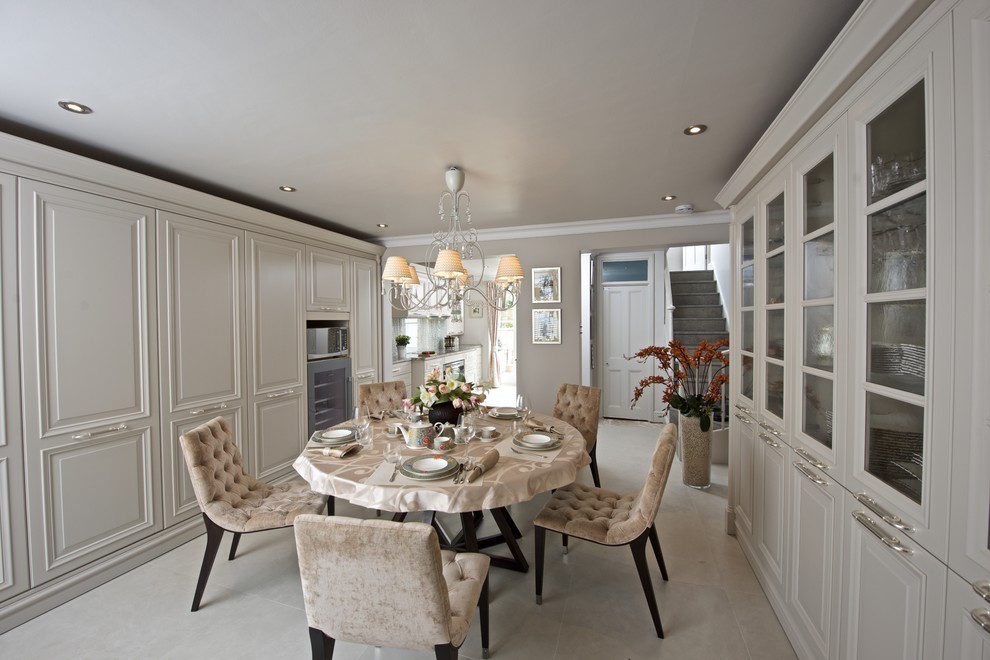 Design ideas for a traditional dining room in London with no fireplace and beige walls.