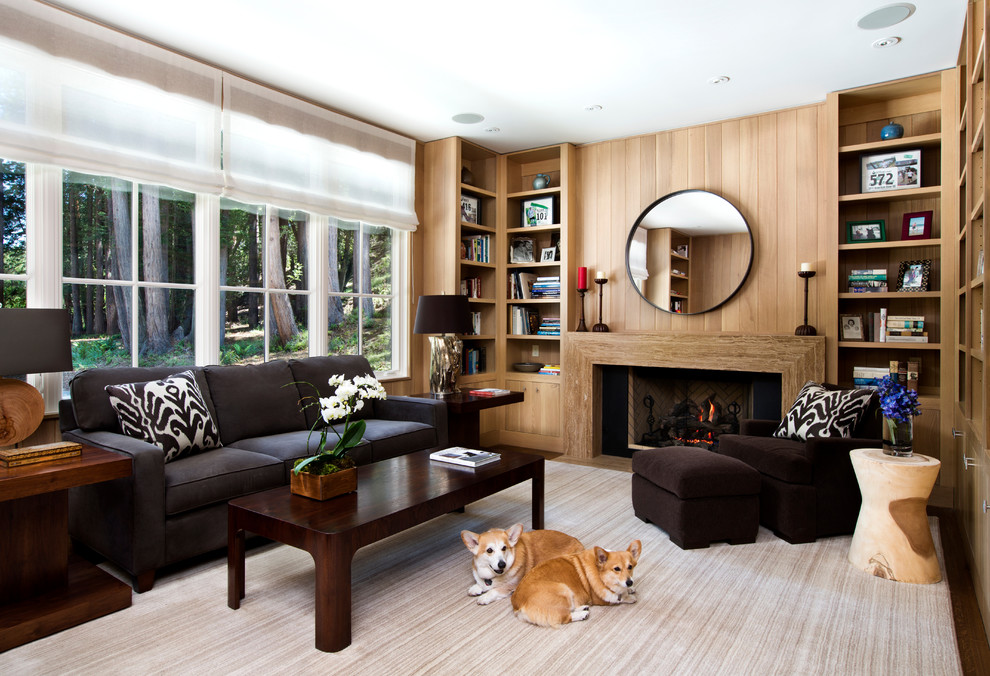 This is an example of a transitional living room in San Francisco with a library.
