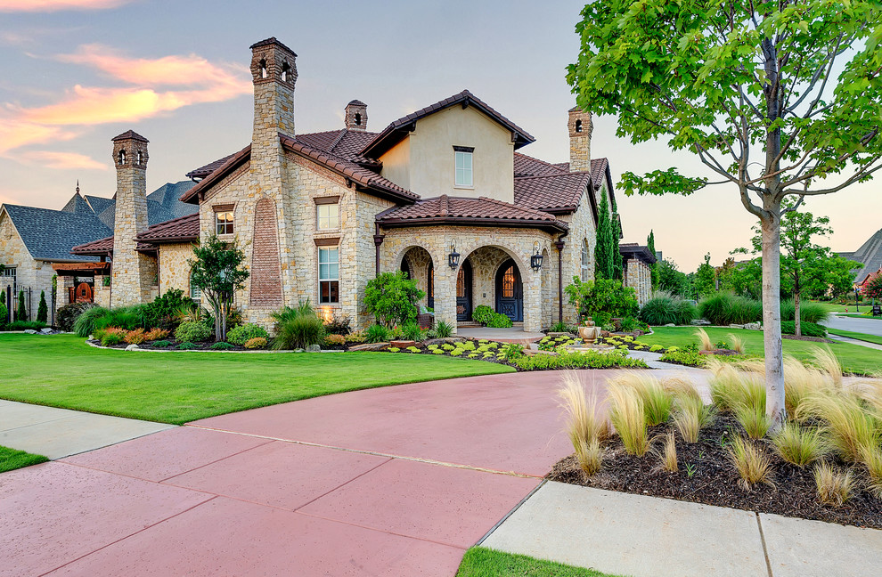 Tuscan home design photo in Dallas