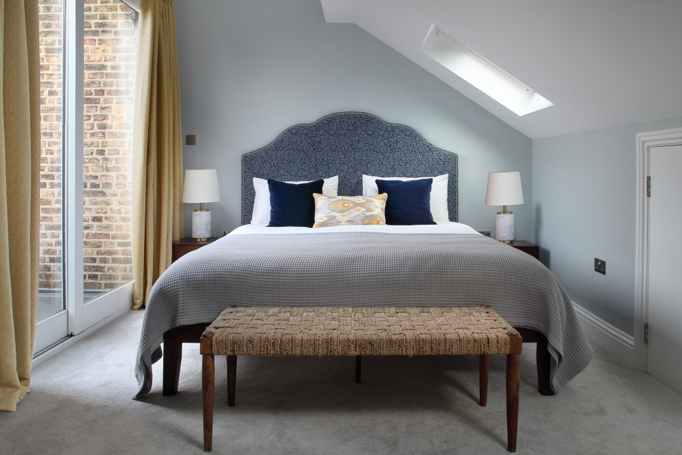 Photo of a transitional bedroom in Other.