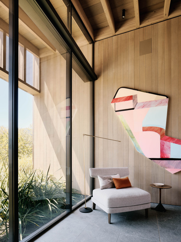 Immagine di un'ampia veranda minimalista