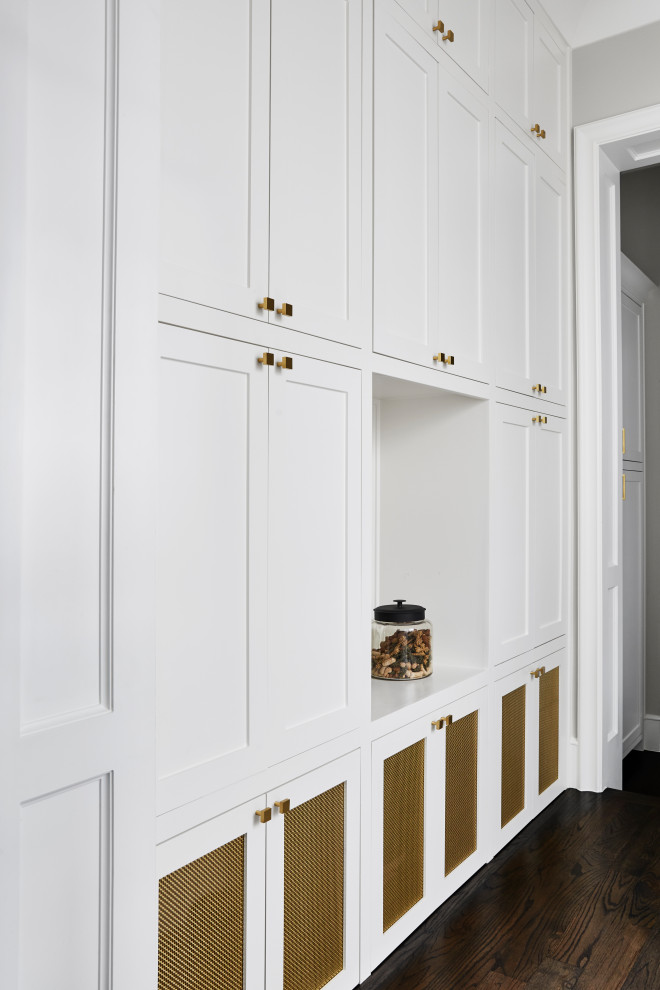 Kitchen pantry - large transitional l-shaped dark wood floor and brown floor kitchen pantry idea in Dallas with an undermount sink, recessed-panel cabinets, white cabinets, quartzite countertops, black backsplash, glass tile backsplash, stainless steel appliances, an island and black countertops