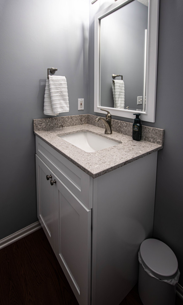 Photo of a small classic cloakroom in Cleveland with flat-panel cabinets, white cabinets, grey walls, a submerged sink, engineered stone worktops, grey worktops and a built in vanity unit.