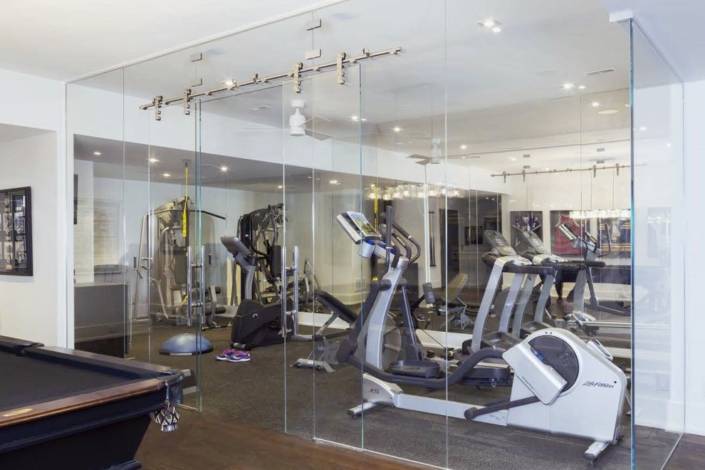 This is an example of a large contemporary multipurpose gym in Toronto with white walls.