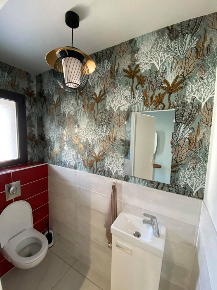 Photo of a small modern cloakroom in Toulouse with beaded cabinets, white cabinets, a wall mounted toilet, multi-coloured tiles, ceramic tiles, multi-coloured walls, ceramic flooring, a console sink, quartz worktops, beige floors, white worktops, a floating vanity unit and wallpapered walls.