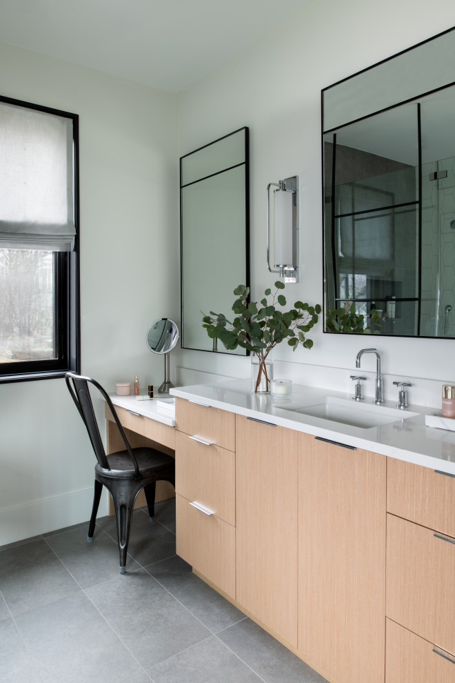 Mid-sized trendy master porcelain tile, gray floor and double-sink bathroom photo in DC Metro with light wood cabinets, an undermount sink, quartz countertops, a hinged shower door, white countertops and a built-in vanity