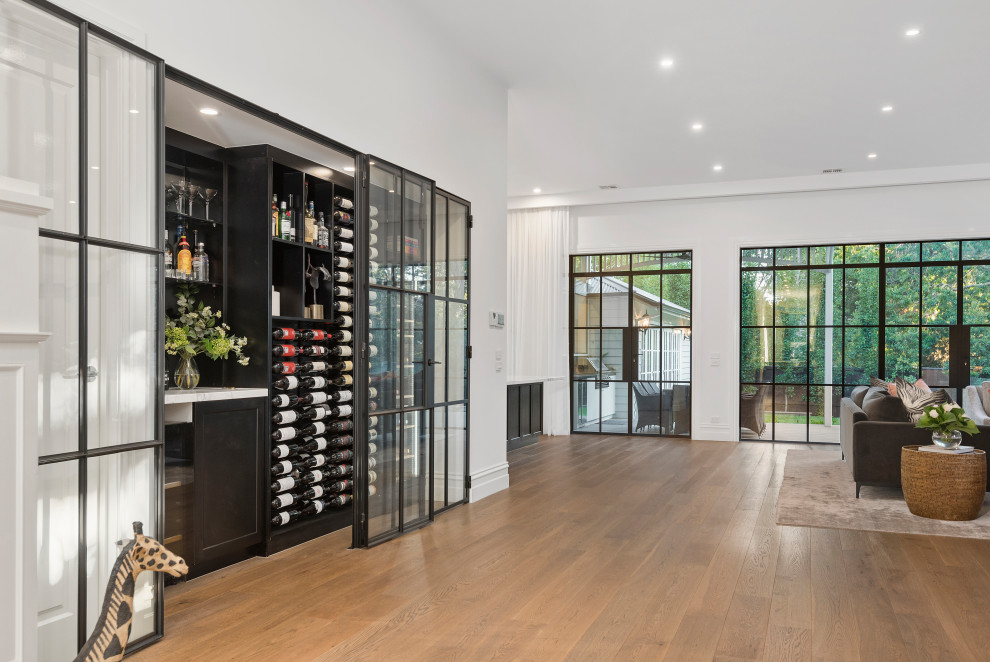 Large transitional wine cellar in Melbourne.
