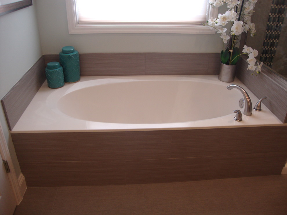 This is an example of a mid-sized modern master bathroom in Other with an undermount sink, shaker cabinets, dark wood cabinets, granite benchtops, blue tile, mosaic tile, blue walls and porcelain floors.