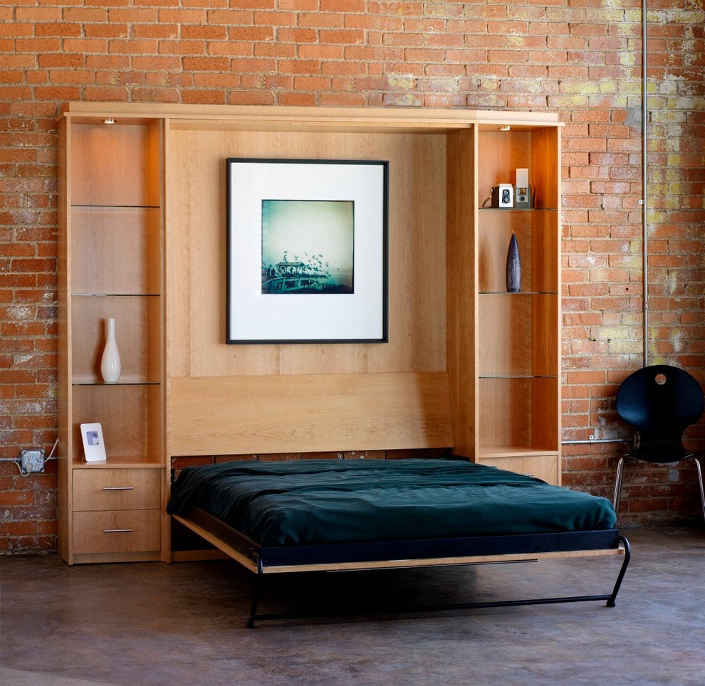 This is an example of a mid-sized modern guest bedroom in Other with orange walls, linoleum floors and no fireplace.