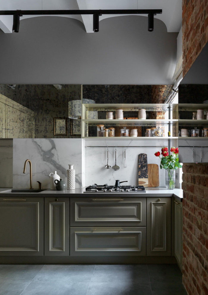 Small midcentury l-shaped kitchen in Moscow with white splashback, mirror splashback and grey floor.
