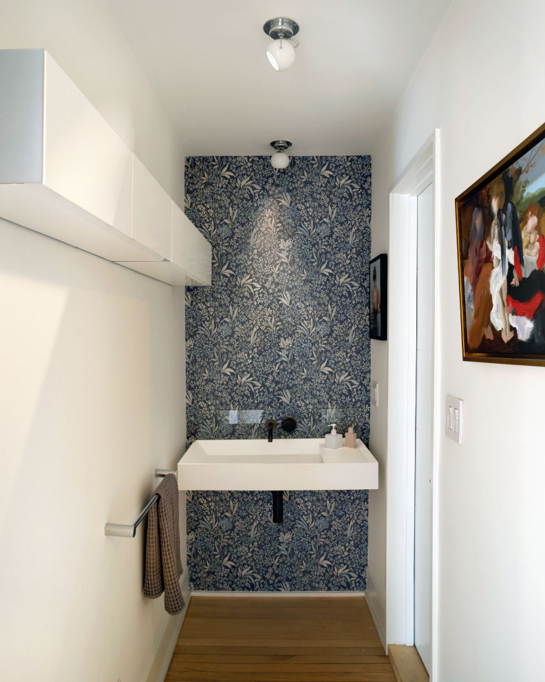 Photo of a contemporary powder room in Portland Maine.