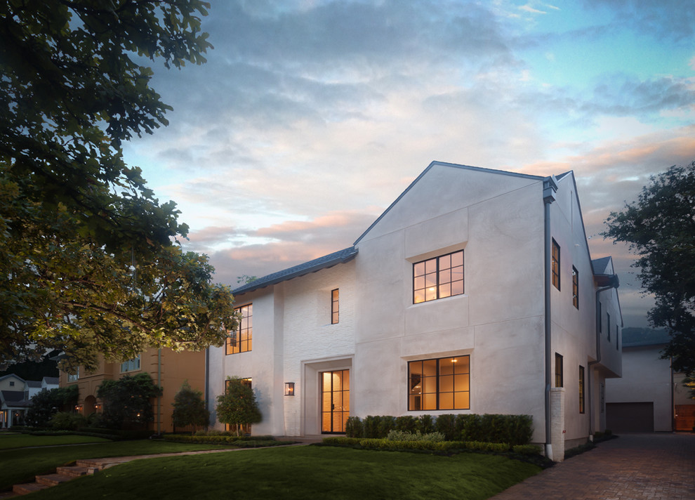 Large transitional beige two-story exterior home photo in Houston