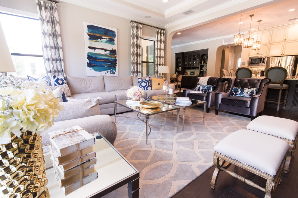 Photo of a mid-sized transitional formal open concept living room in Orange County with beige walls and dark hardwood floors.