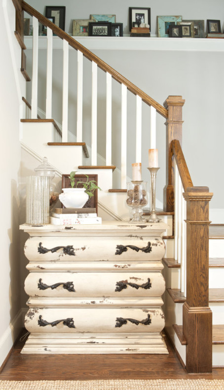 unique bookcase under stairs
