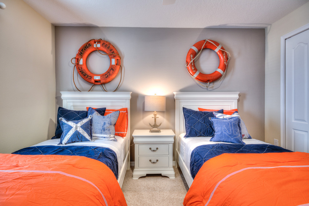 Design ideas for a mid-sized beach style gender-neutral kids' bedroom for kids 4-10 years old in Orlando with grey walls, carpet and beige floor.